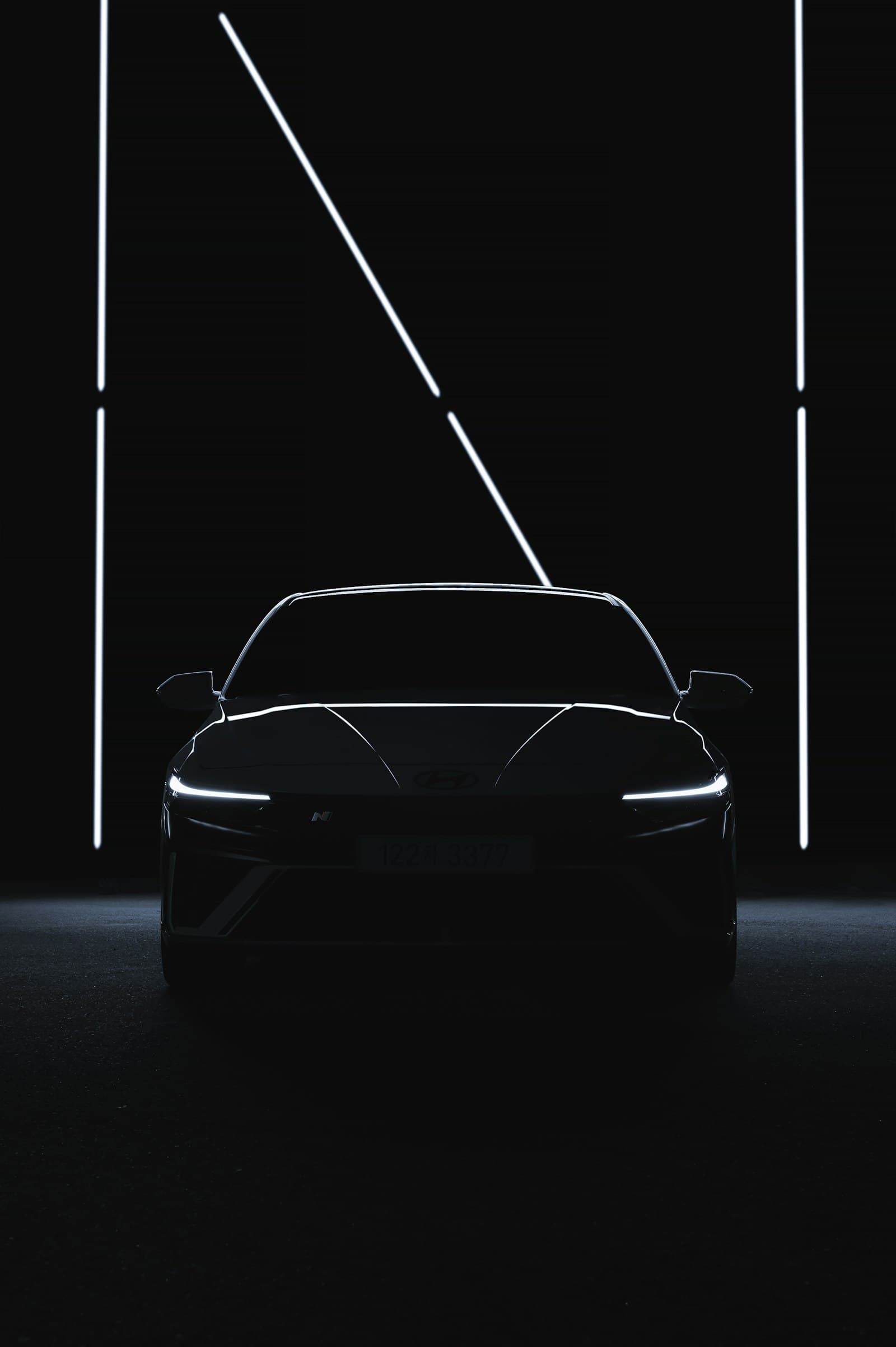 A vehicle lit against darkness
